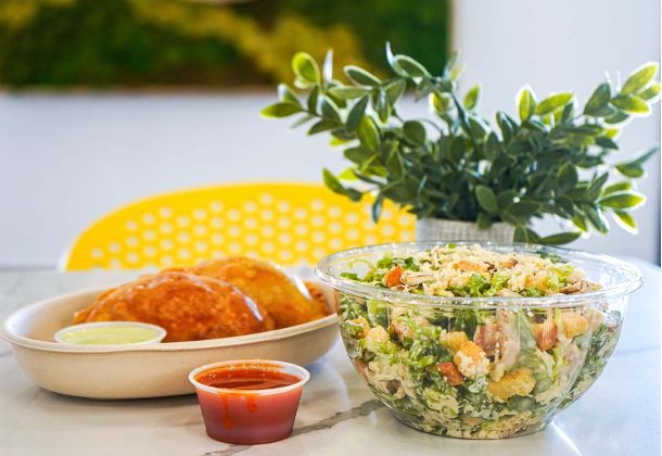 salad_and_empanadas_on_table